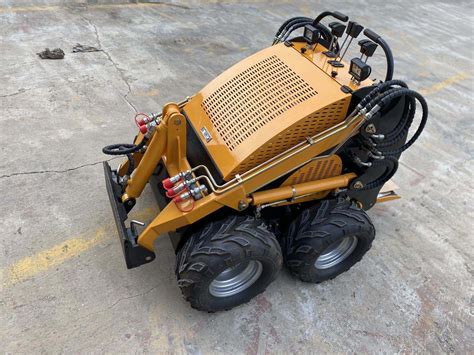 mini wheeled skid steer|mini skid steer hydraulic pump.